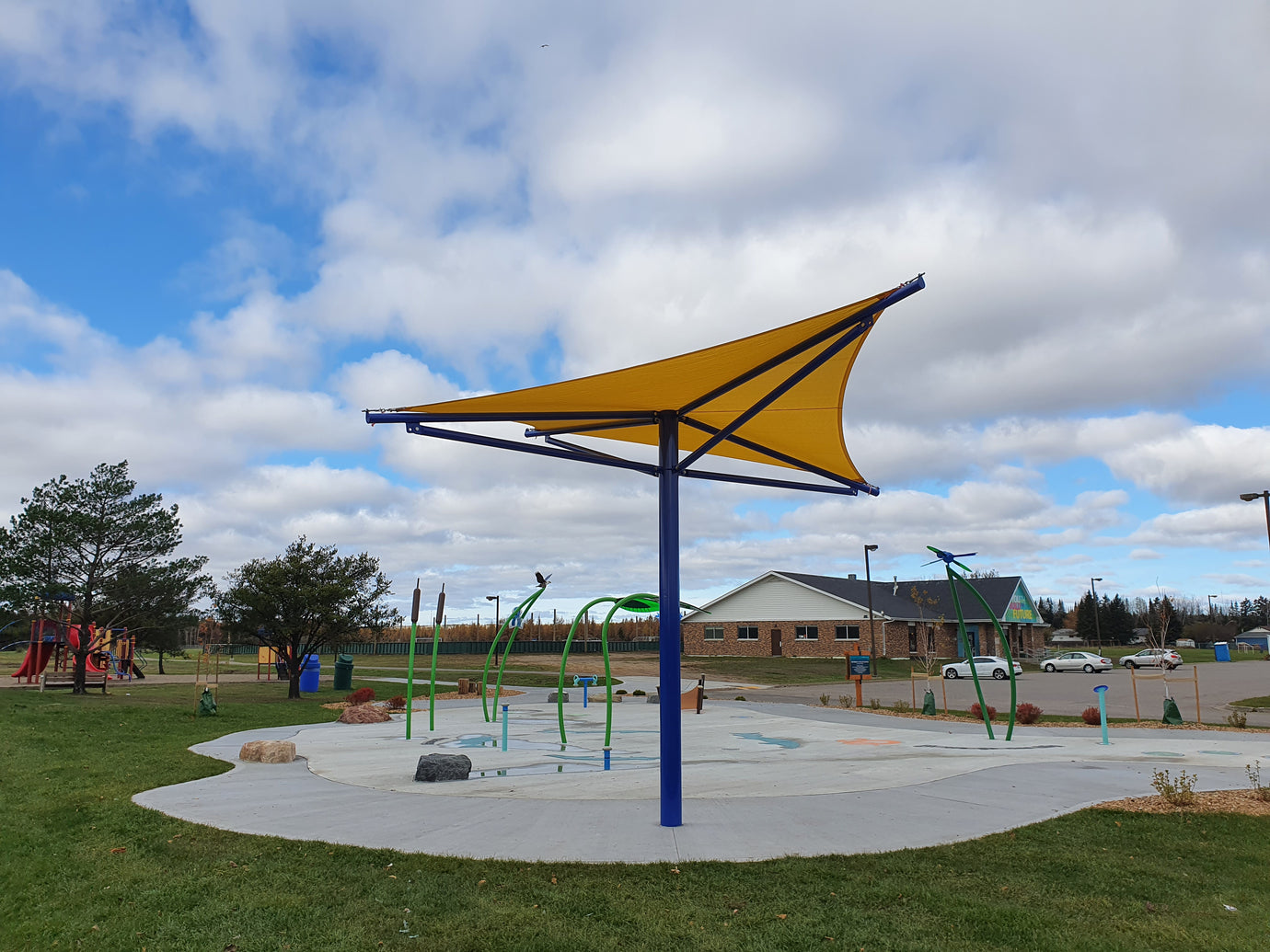 image of a yellow sun shade on a playground