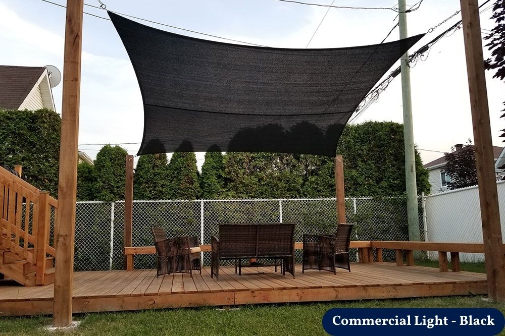 modern deck with black shade sail providing deck weather protection