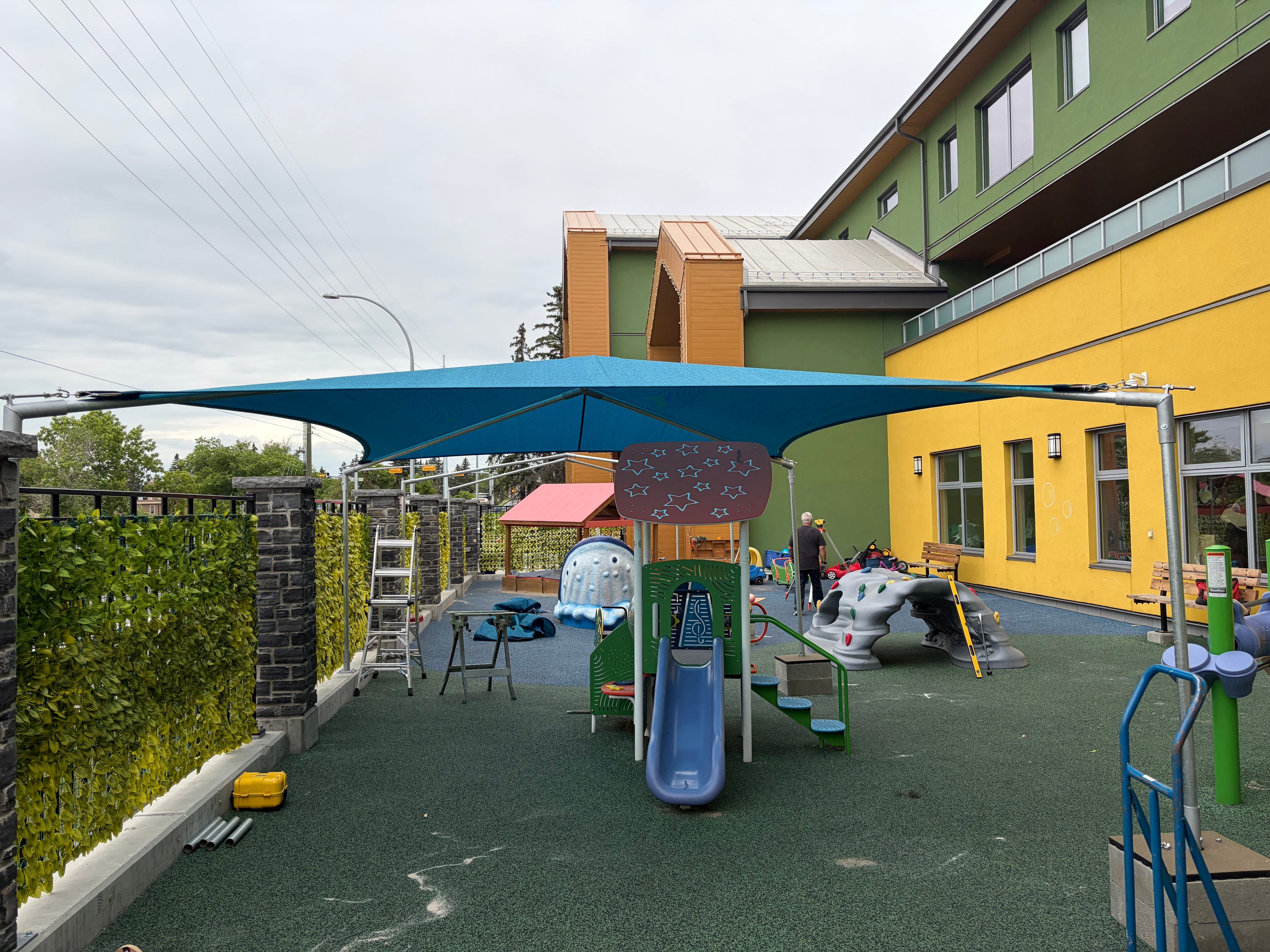 Waterproof shade sail at Children's Cottage playground