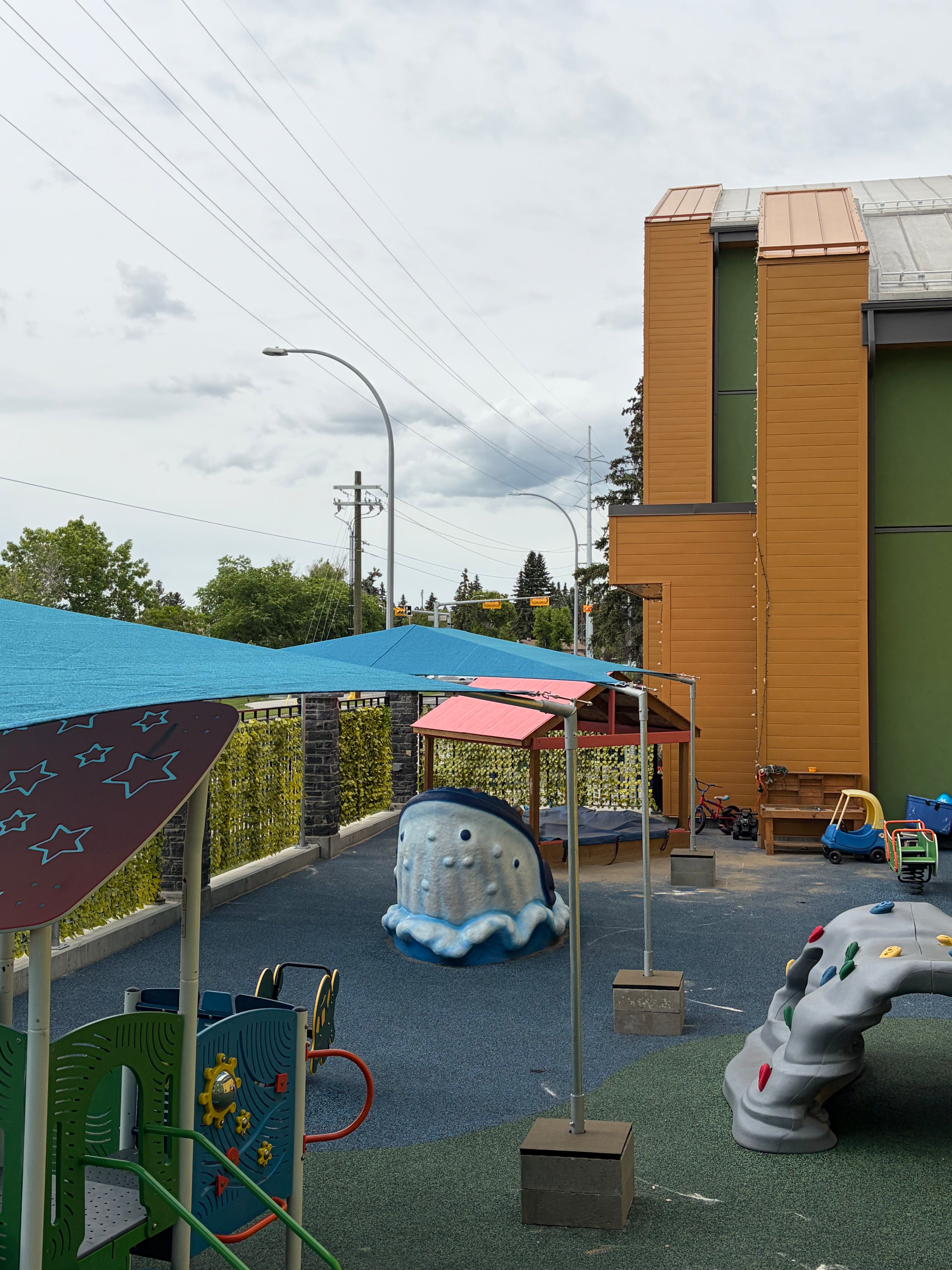 Commercial shade sail installation at childcare facility