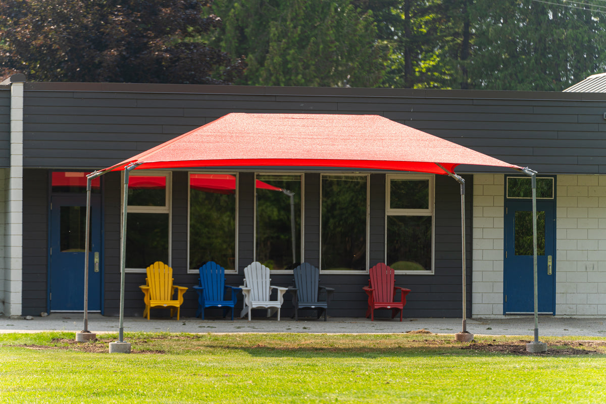 A large red canopy tent with metal support poles