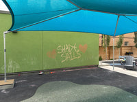 Custom shade sail installation at outdoor recreation area